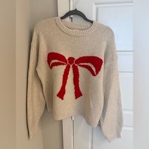 a new day Cream Sweater with Red Bow